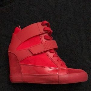Red heeled sneakers